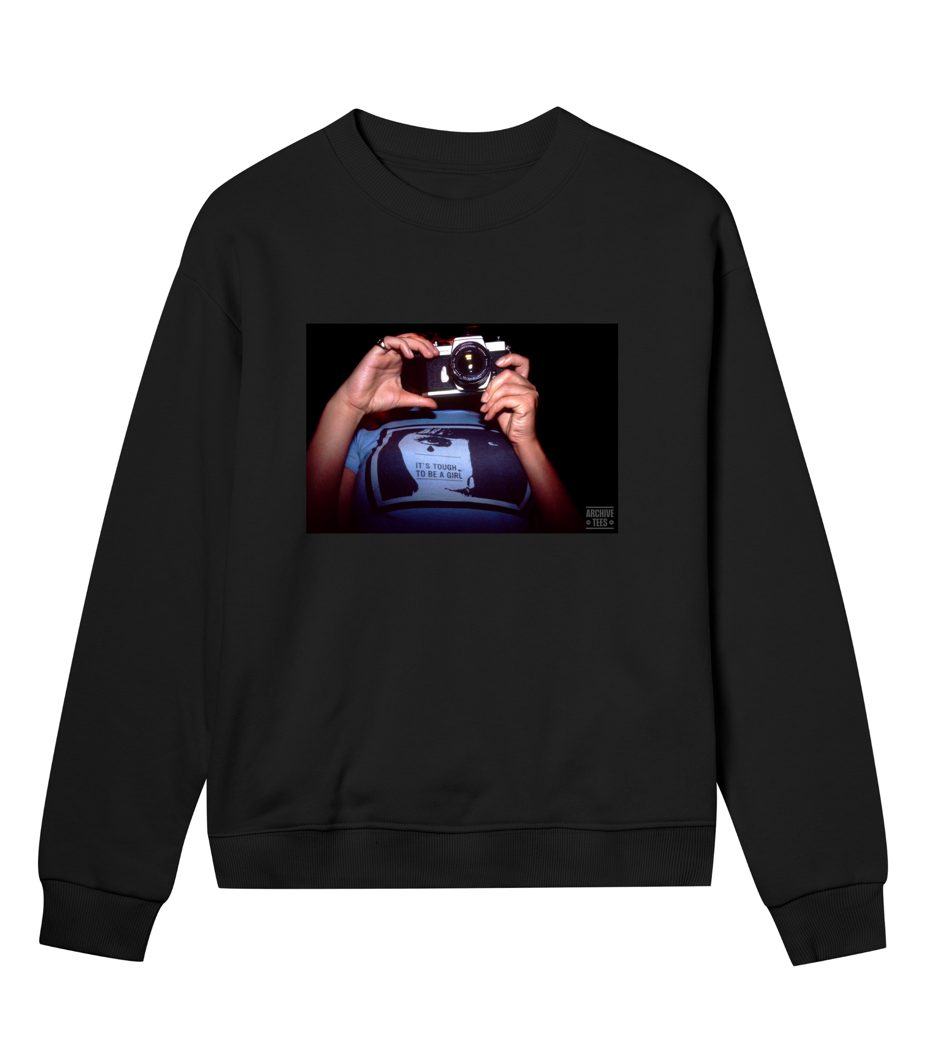 Archive Tees women's sweatshirt in black with vintage photograph from 1998 of woman holding a camera wearing a shirt with the words, it’s tough to be a girl. Vintage women's sweatshirt by Archive Tees. Sold by Archive Tees shop.