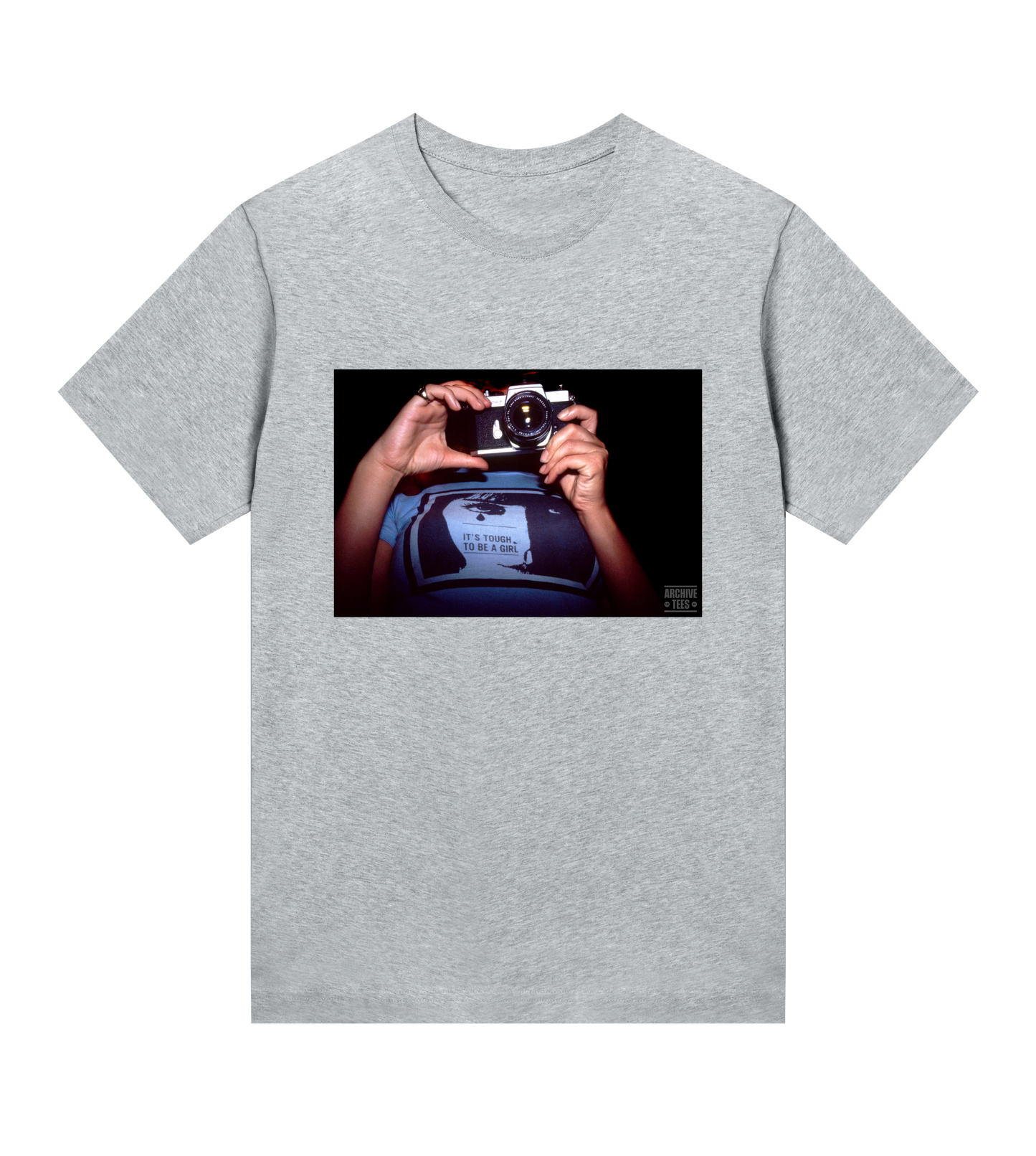 Archive Tees women’s T-shirt in grey with vintage photograph of a girl holding a camera with text saying, it’s tough to be a girl. Vintage women's T-shirt by Archive Tees. Sold by Archive Tees shop.