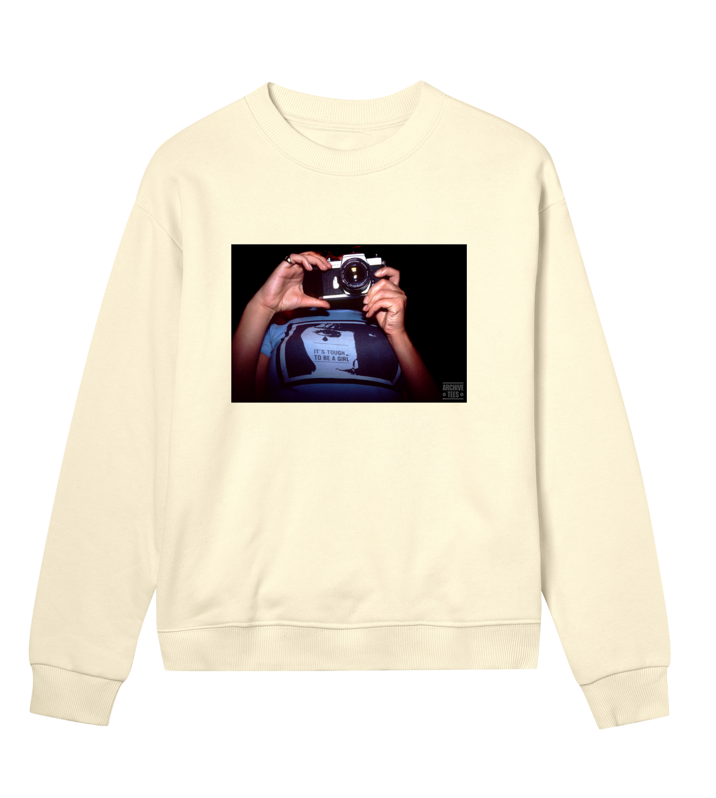 Archive Tees women's sweatshirt in yellow with vintage photograph from 1998 of woman holding a camera wearing a shirt with the words, it’s tough to be a girl. Vintage women's sweatshirt by Archive Tees. Sold by Archive Tees shop.