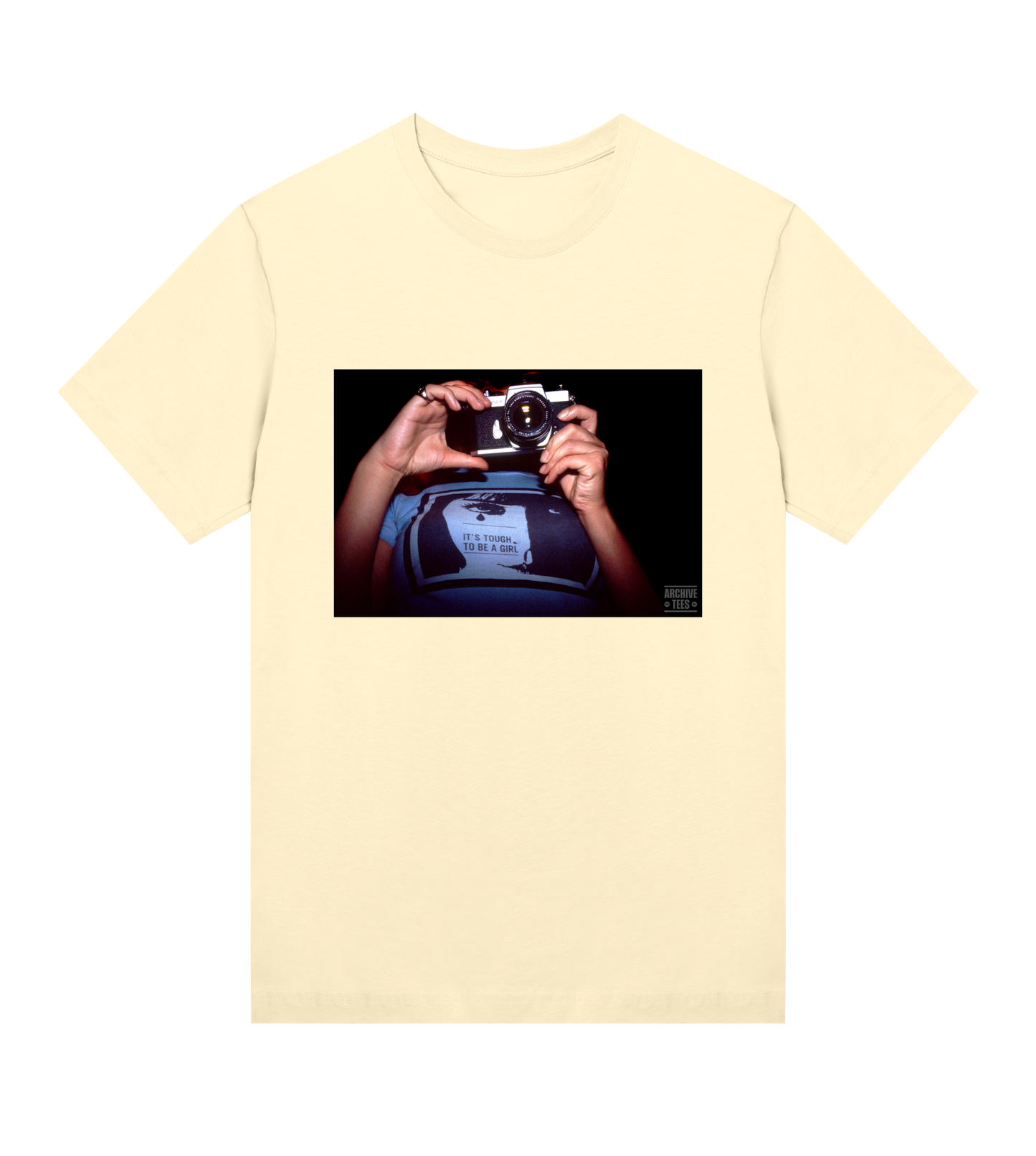 Archive Tees women’s T-shirt in yellow with vintage photograph of a girl holding a camera with text saying, it’s tough to be a girl. Vintage women's T-shirt by Archive Tees. Sold by Archive Tees shop.